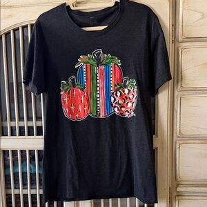 Black T-Shirt with Colorful Pumpkin Design